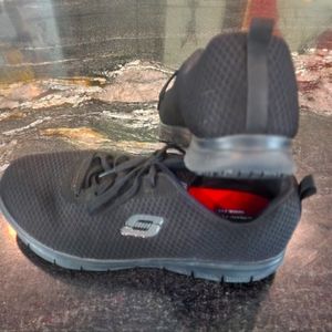 Women's black Skechers comfy work shoes